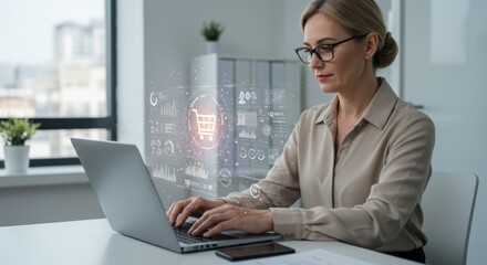 Businesswoman working on laptop with overlayed e-commerce interface