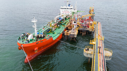 Oil tanker ship. Red Oil Tanker runing in the ocean sea. petroleum ship transportation import...
