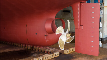 Propeller of large ship spinning power working and water splash contrail . Close up image detail Stern back of Vessel ship, Logistics Transportation industry express technology Freight.