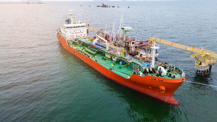 Oil tanker ship. Red Oil Tanker runing in the ocean sea. petroleum ship transportation import...