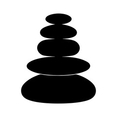 Silhouette of stacked zen stones in perfect balance representing peace and harmony