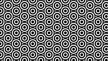 A large number of black and white gun pattern targets are stacked on top of each other
