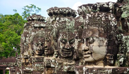 Ancient stone faces in a temple complex