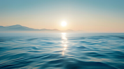 Obraz premium Peaceful sunrise over calm ocean with soft colors reflecting on water surface