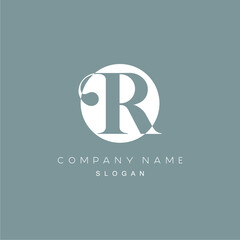 Chic and Classy Initial 'R' Logo Concept in a Bold Serif Style, Encased in a Clean Circle. Perfect for Personal Branding, Boutique Businesses, or Professional Services.