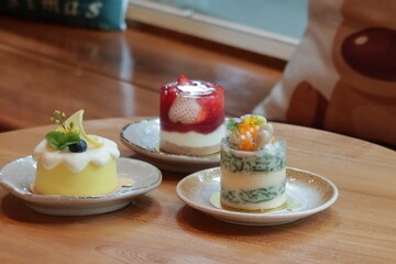 dessert with cream and fruits