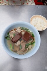 Top view of pork blood soup, a popular breakfast dish in Thailand.