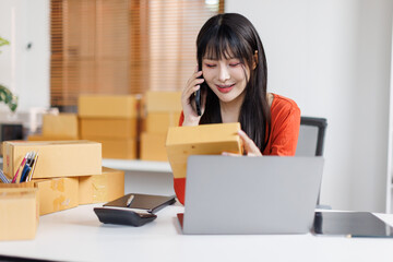 Startup SME small business entrepreneur SME or freelance Asian woman calling phone, online...