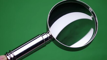 animated 4K video magnifying glass highlighting objects green screen background ideal emphasizing details educational materials tech demos scientific explainer