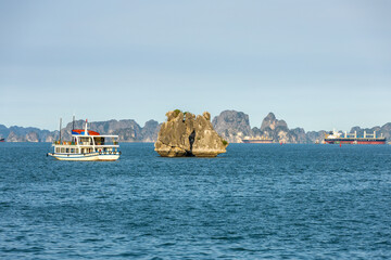 Hon Ga Choi Island or Cock and Hen, Fighting Cocks Island located in Halong bay, Vietnam, Trong Mai...
