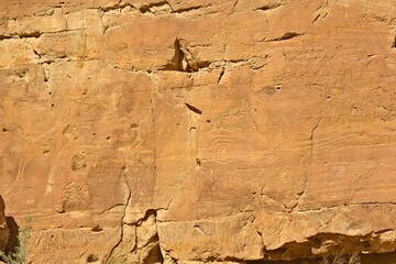 Petroglyph on a cliff wall at Chaco Canyon Pueblo, New Mexico.