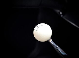 Shifter knob in a car at a car show