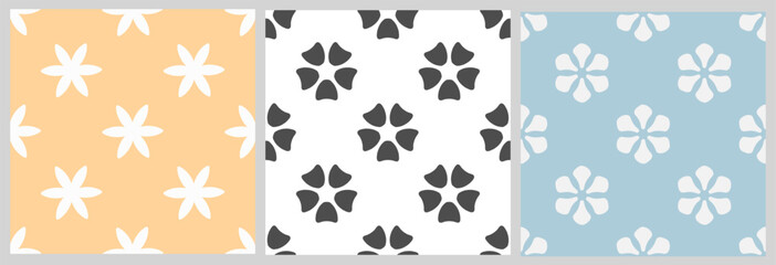 Set of seamless patterns with minimalist flowers. Abstract floral prints in pastel colors