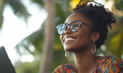 Inclusive image of happy Black female digital nomad working remotely on a laptop. Smiling candid African American laughing on virtual video call meeting. Inclusive and flexible, Generative AI