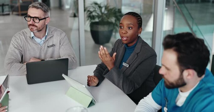 Healthcare, woman and group with laptop, meeting or research for investment, serious or opportunity. Above, administrator and people with tech for funding grant, planning and discussion in clinic