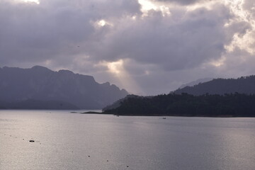 Eerie Atmosphere: Dark Storm Clouds Gathering, Ratchaprapha Dam, Ratchaprapha Dam Sunset