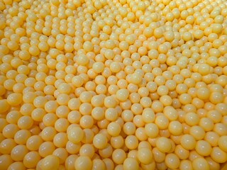 photo of ball pit, bubble, playground, yellow background, abstract background