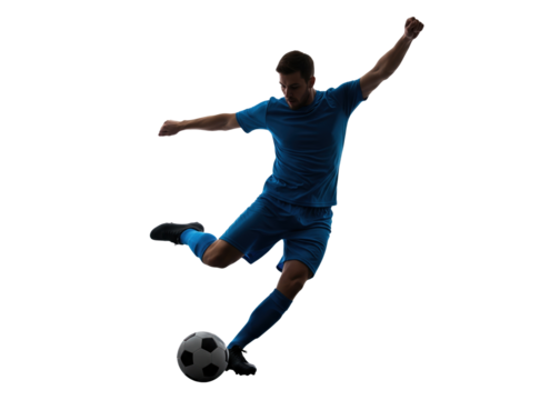 soccer player in a blue uniform kicking a ball