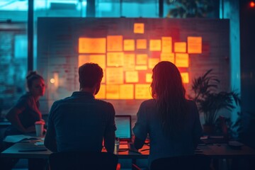 Young group of colleagues collaborating on a new project in a startup company office, working together in a co-working space to bring innovative ideas to life, Generative AI