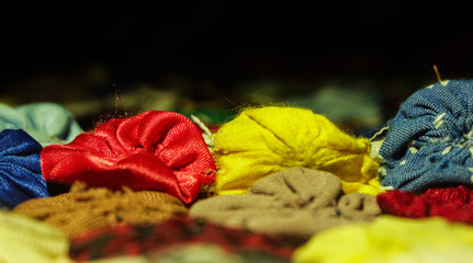macro detail of colored fabrics
