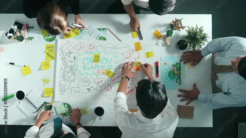 Poster top view of professional business team working together to brainstorm environmental idea by using mi