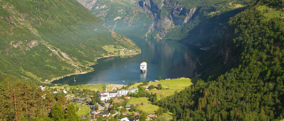 cruise ship in geiranger fjord in norway