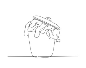 Dirty clothes in the basket outline drawing illustration. one continuous line drawing of Dirty clothes in the basket.