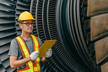 Professional Asian engineer male working service power plant turbine fan blade electrical generator