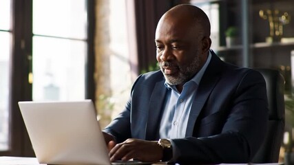 Businessman working on laptop