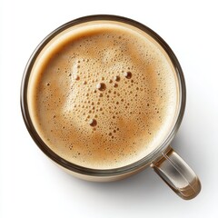 A top-down view of a glass mug filled with frothy coffee on a white background