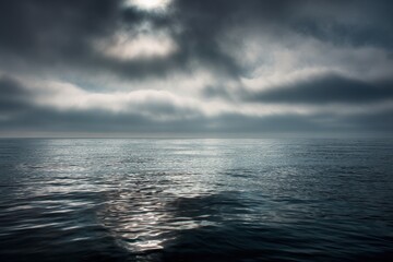 Tranquil maritime conditions with clouds
