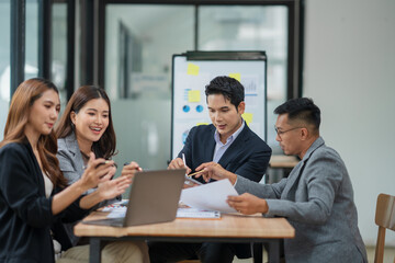 Group of business people are having a meeting at the office.