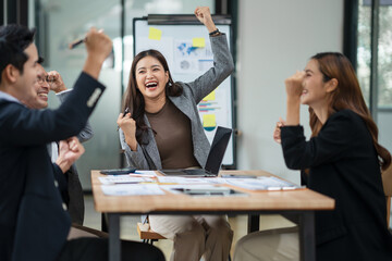 Asian business group delighted with success in their careers	
