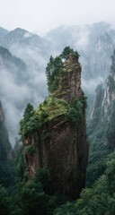 Misty mountain peak, lush vegetation