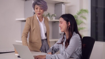 Asian Businesswomen Collaborating Mentoring Professional Office Meeting Using Laptop Business Strategy Discussion Workplace Innovation - Powered by Adobe