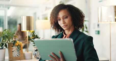 Blog, reading and tablet with journalist woman in office for editing or review of report. App, journalism and news article wit business person in workplace for online magazine or internet publication