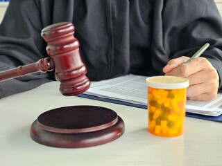 Legal expert reviews case involving medication and patient rights preparing for courtroom proceedings