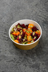 salad with beets, pumpkin, herbs and seeds