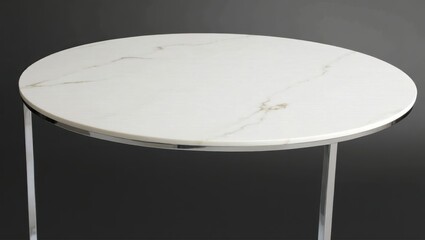 Round coffee table with white marble top and chrome base.