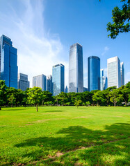 Obraz premium City park with green lawn, and skyscrapers.