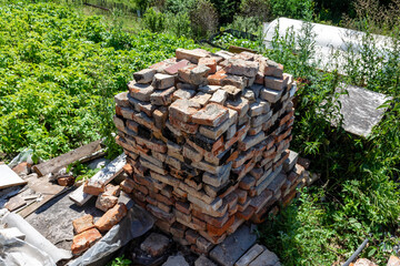 A stack of old broken bricks