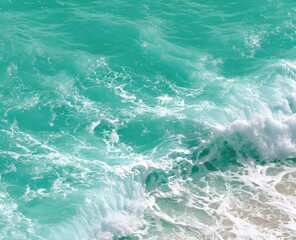 Fototapeta premium Turquoise waves crashing on a beach