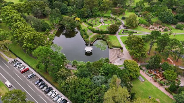Wollongong, NSW, Australia: Drone Video of Botanic Garden featuring the circular Rose Garden and Rotunda Duck Pond with picturesque pavilions that are sometimes used as wedding venues.