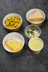 lunch set soup meat and salad with dessert in disposable dishes