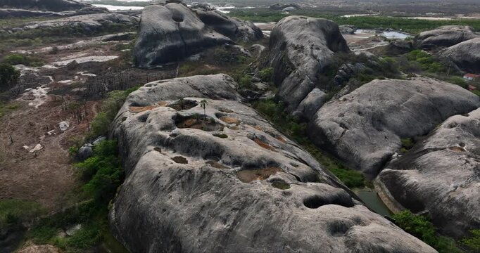 Aerial View of Granite Rock Formation with Eroded Panholes in Brazil