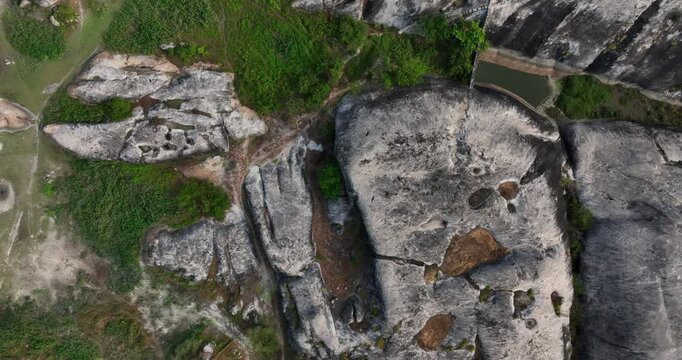 Aerial Top Down Spiraling View of Potholes in Bedrock - Rock Erosion