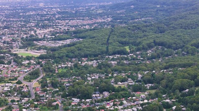 South Coast, NSW, Australia: Drone UHD Video -Sweeping over holiday homes over a string of laid-back towns located south of Sydney with pretty beaches and incredible bushwalks.