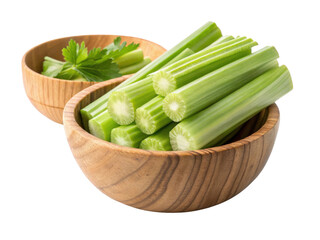 Fresh celery stalks arranged in wooden bowl with smaller bowl of celery leaves nearby create vibrant and healthy display