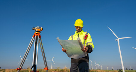 Engineer inspection and survey work in wind turbine farms rotation