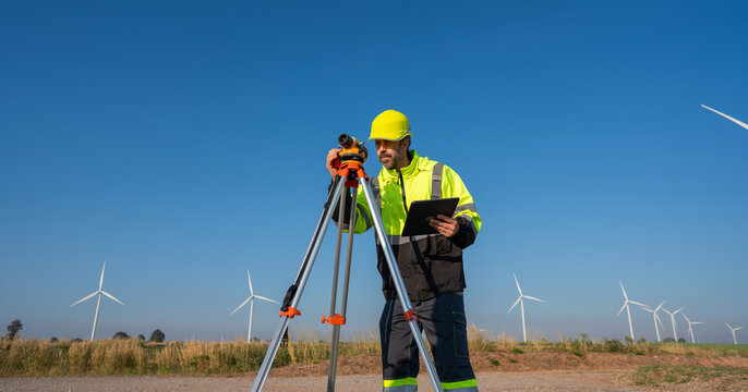 Engineer inspection and survey work in wind turbine farms rotation